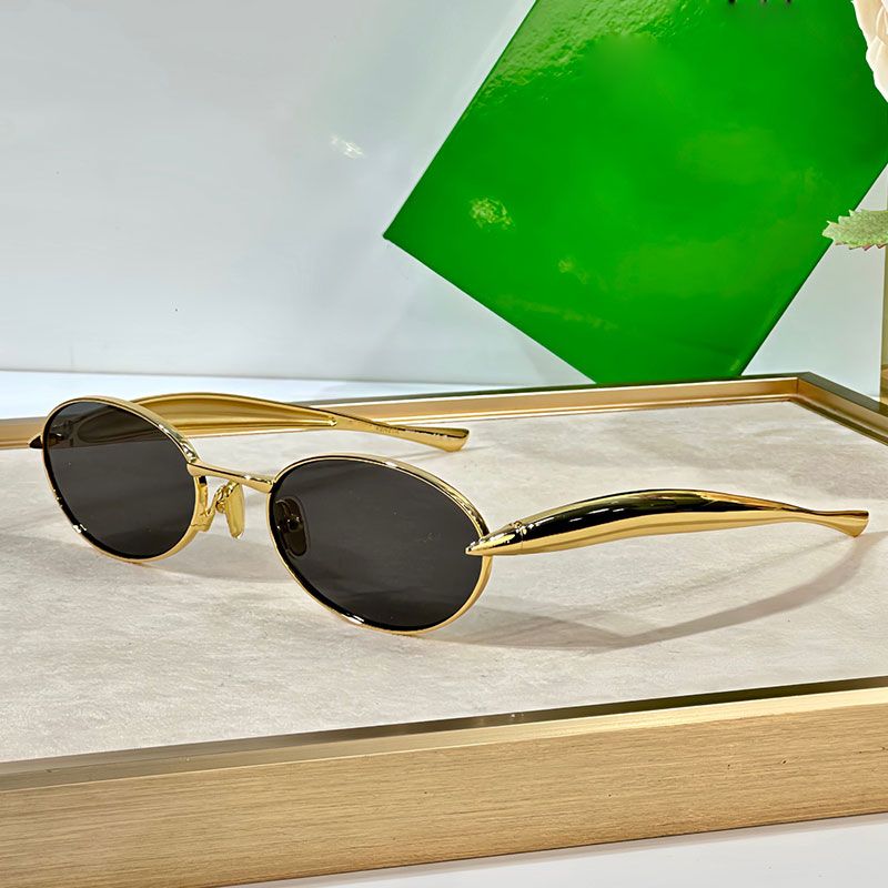 Noir Eclipse Sunglasses | Gold Oval Shades